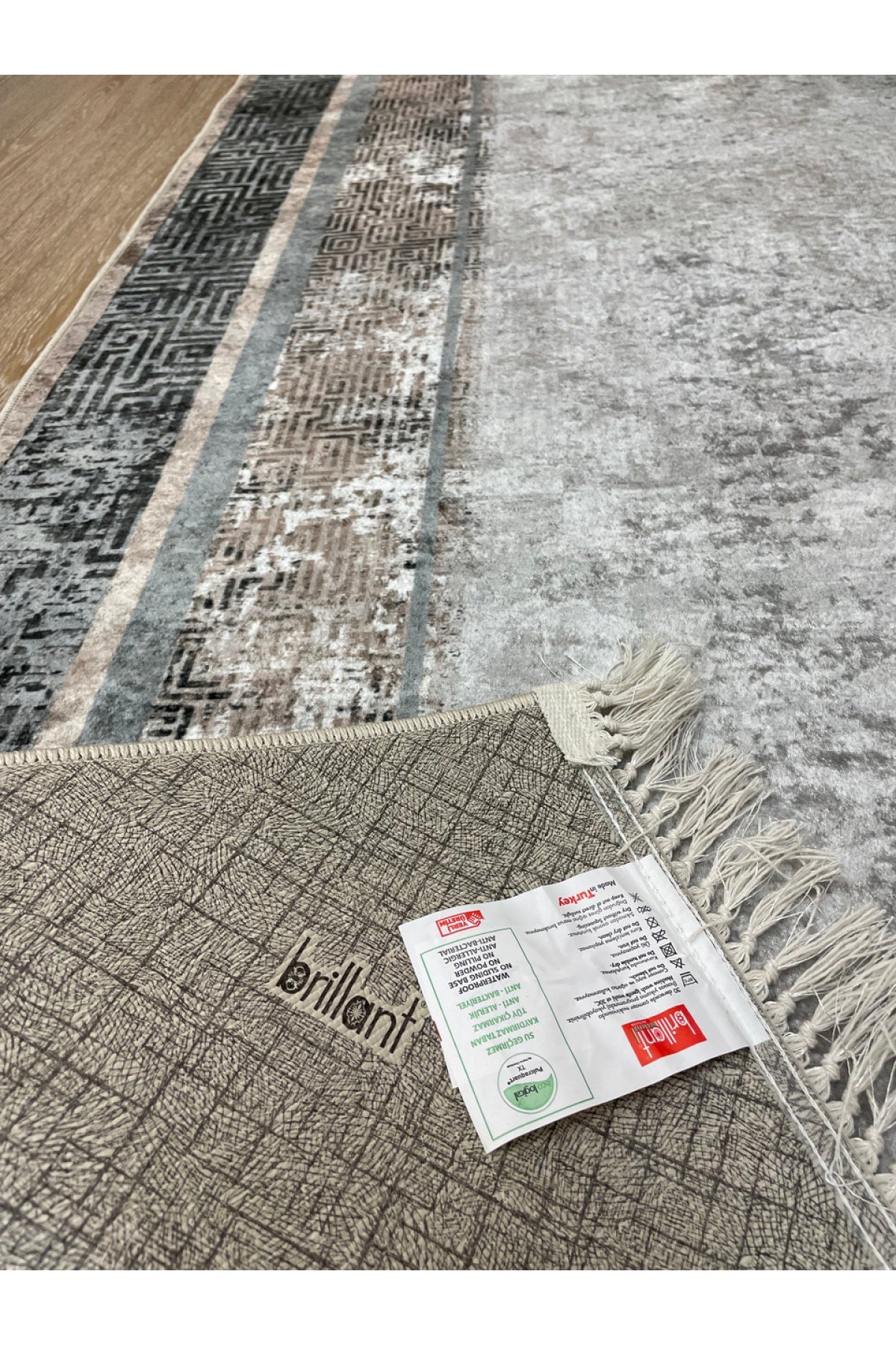 Vilmar Modern Striped Latex Leather Base Fringed Rug - Beige