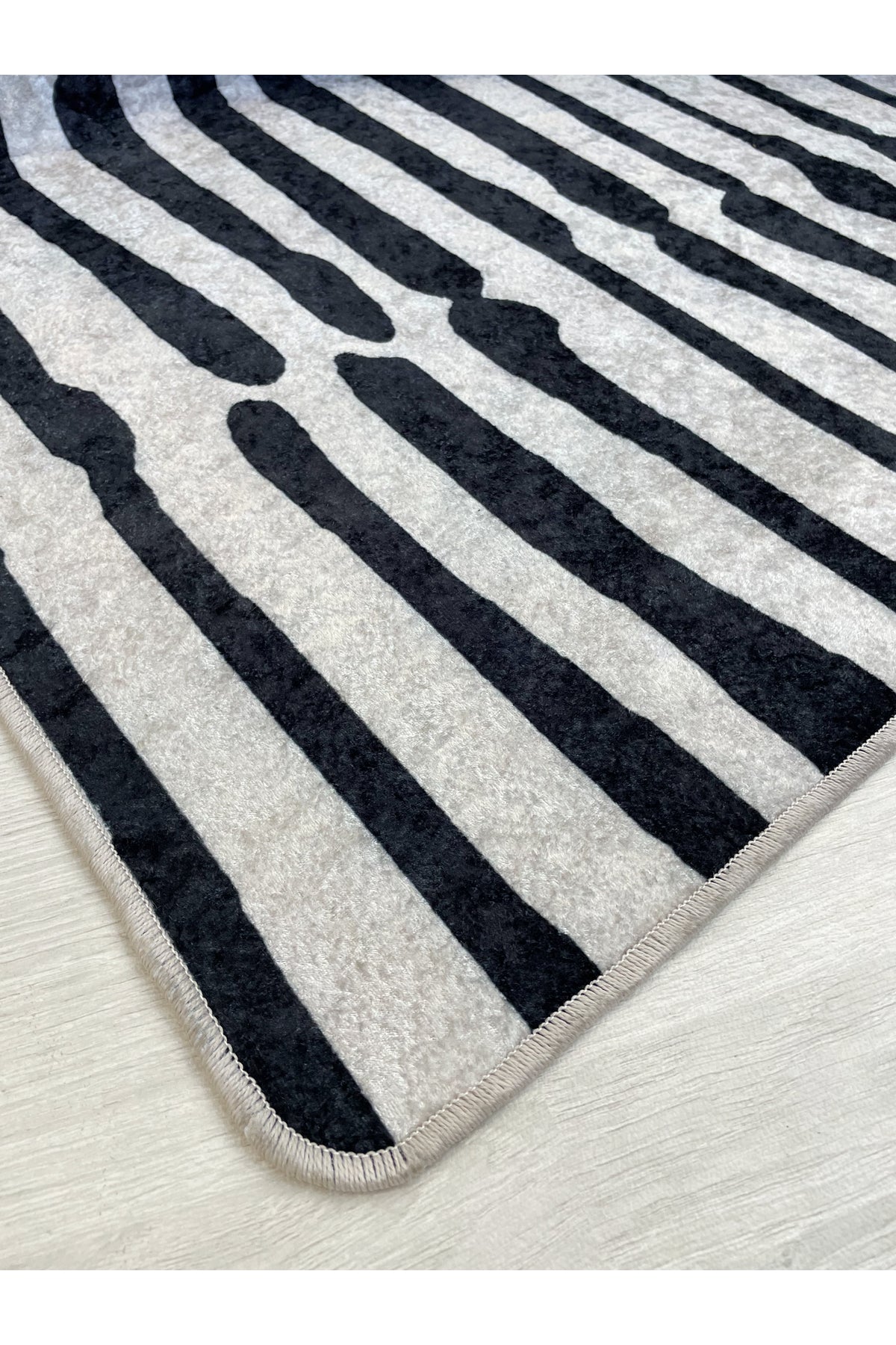 Beige-Black Abstract Look Latex Leather Base Rug